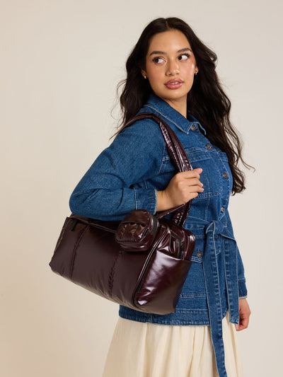CALPAK Luka Mini Duffel in maroon Glazed Dark Cherry on a white background; DLM2501-GLAZED-DARK-CHERRY view 2