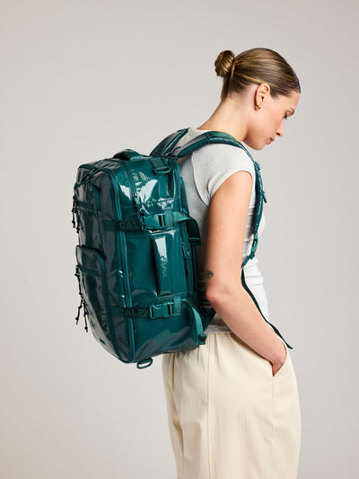 CALPAK Terra 26L Laptop Backpack in dark blue green Kale with multiple pockets on a white background; BPH2201-KALE view 2