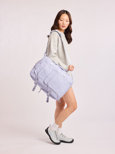 CALPAK Terra 26L Laptop Duffel Backpack with multiple pockets in light purple Sea Glass on a white background; BPH2201-SEA-GLASS view 2