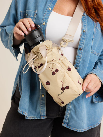 CALPAK Water Bottle Holder in Oatmeal Chery in beige with cherry pattern; AWH2101-OATMEAL-CHERRY view 2