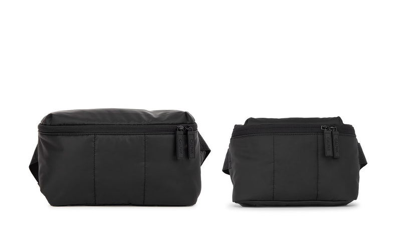 CALPAK Luka Belt Bag and Luka Mini Belt Bag in black Matte Black side by side for size comparison