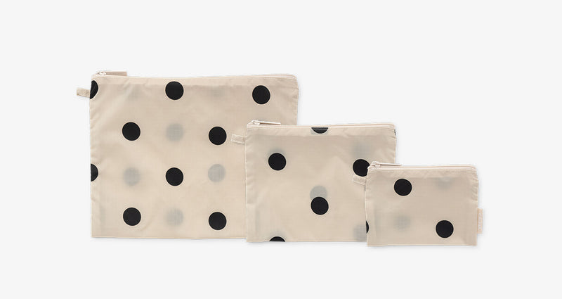 CALPAK Compakt Zippered Pouch Set in white and black Polka Dot